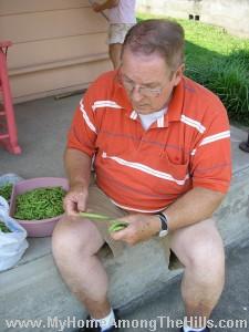 Dad processing beans