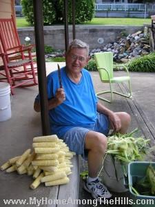 Popaw shucking corn