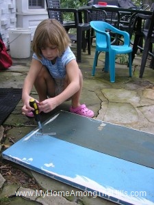 Unscrewing the old shelf