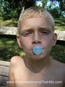 Isaac blowing 1st bubbles with his gum