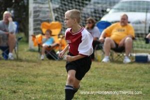 Isaac playing soccer