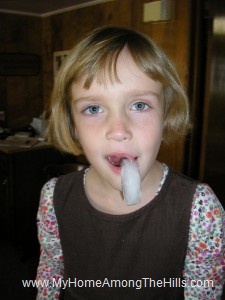 Ice frozen to her lip