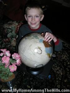 Isaac with his globe 2007