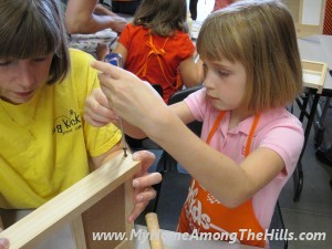 Abigail on her building project!