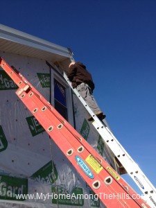 Installing soffit and fascia on our small cabin