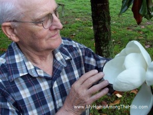 Grandpa with our magnolia tree