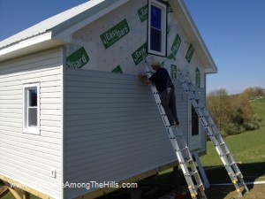 Siding our small cabin