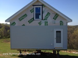 Siding our small cabin