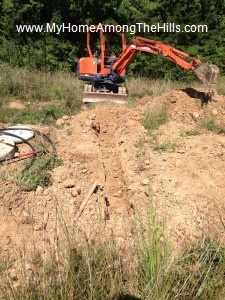 Digging a footer with an excavator