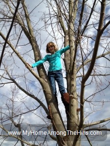 Girl climbing a tree!